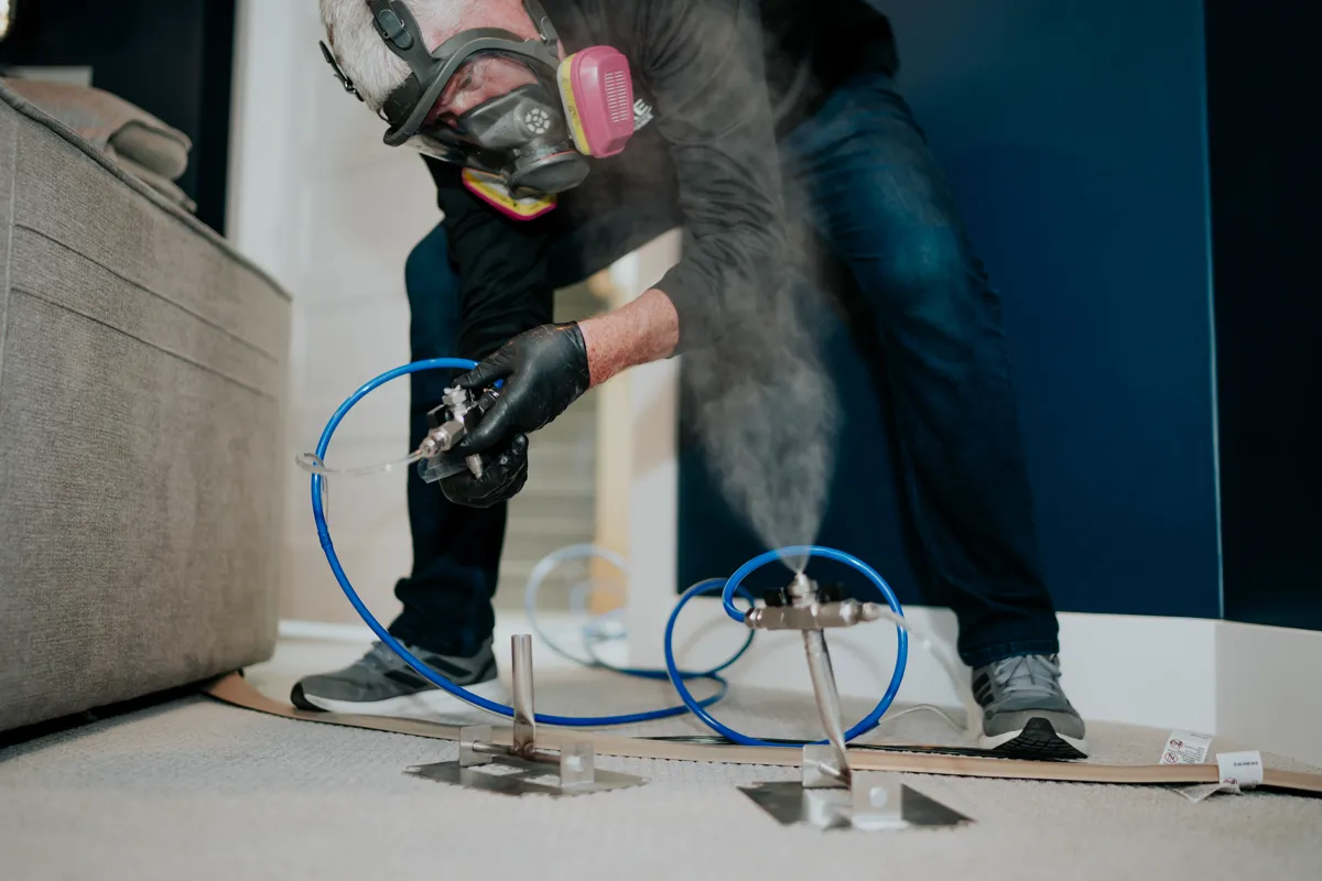 Technician applying patented VaPURE dry fog during a mold remediation
